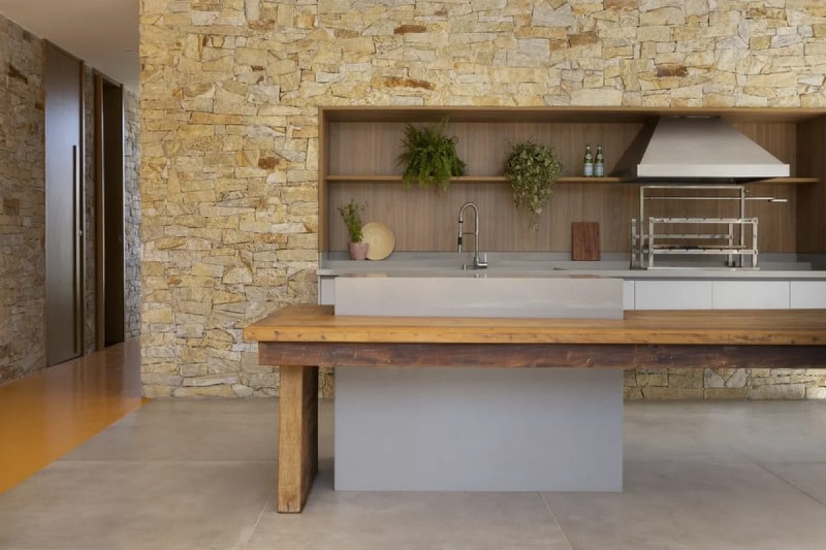 área gourmet com parede de tijolos